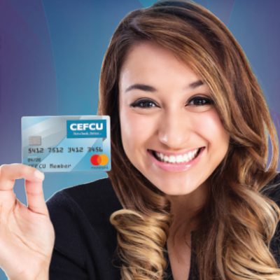 Smiling woman hold CEFCU credit card